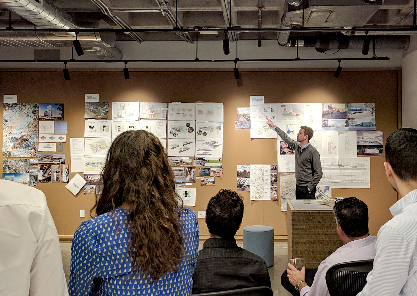 Studio members discuss projects during biweekly Design review Panel presentations
